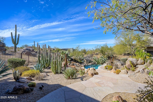 view of patio featuring a fenced in pool