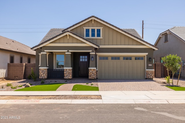 craftsman inspired home with a garage