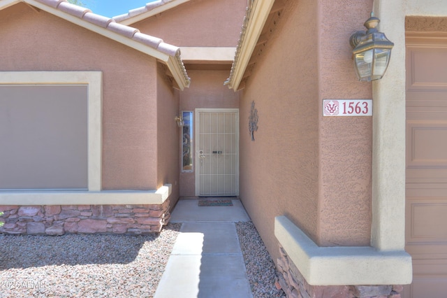 1563 E Peregrine Trl, Casa Grande, AZ 85122 - entrance to property featuring stucco siding