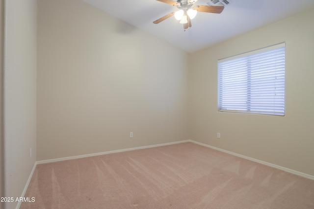 1563 E Peregrine Trl, Casa Grande, AZ 85122 - unfurnished room with light carpet, baseboards, ceiling fan, and lofted ceiling