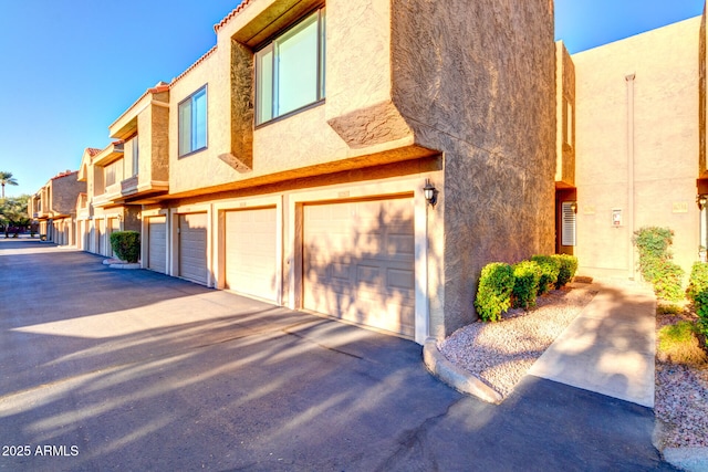 exterior space with a garage