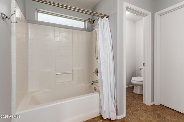 bathroom with toilet, shower / bath combo, and tile patterned floors