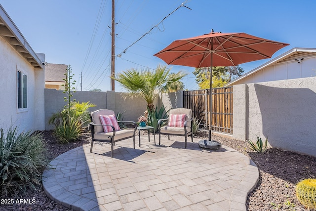 view of patio featuring a fenced backyard