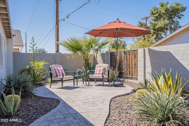 view of patio with a fenced backyard