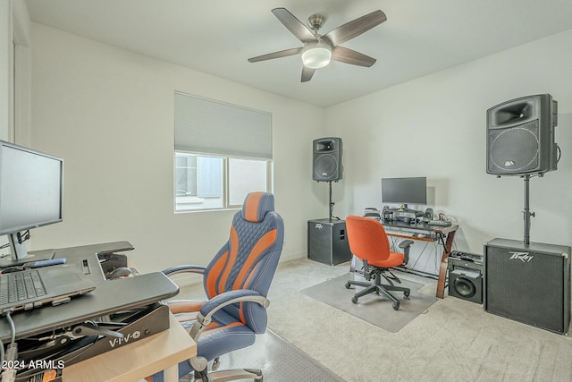 carpeted office with ceiling fan