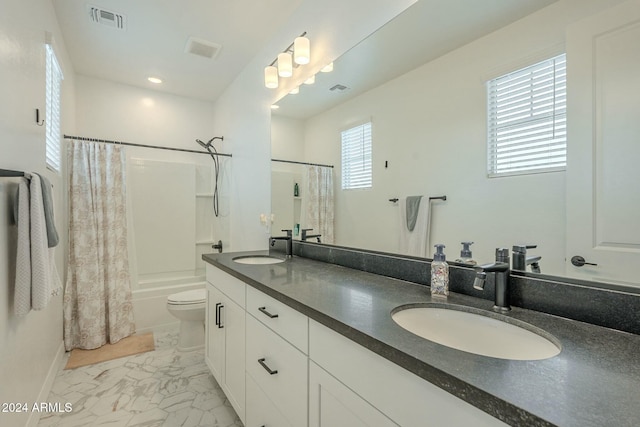 full bathroom featuring vanity, toilet, and shower / bathtub combination with curtain