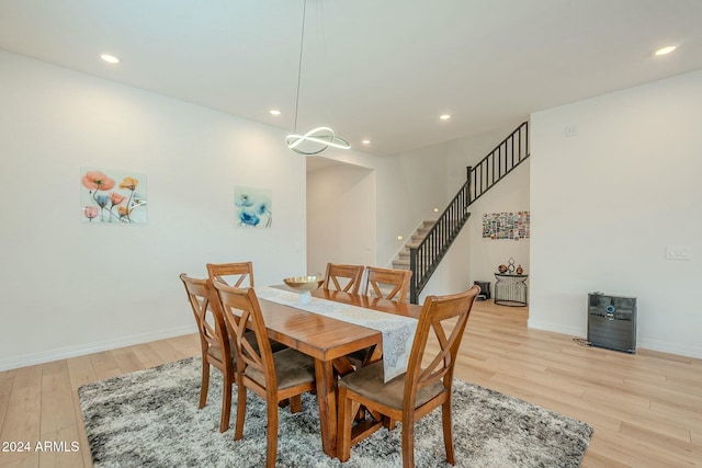 dining area with light hardwood / wood-style floors