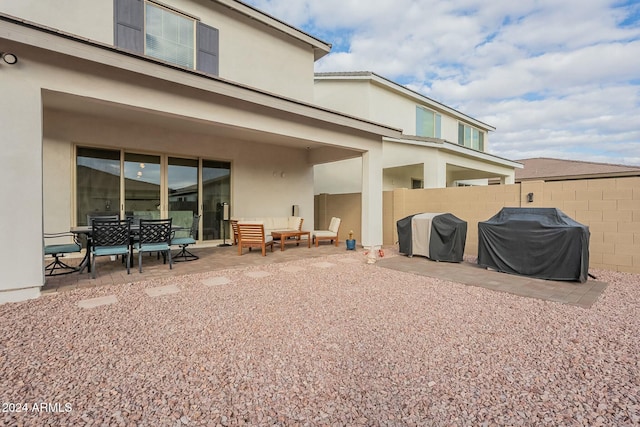 rear view of house with a patio area