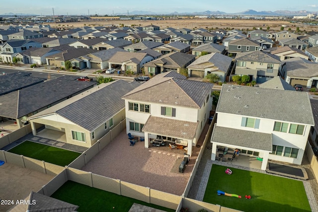 drone / aerial view featuring a mountain view