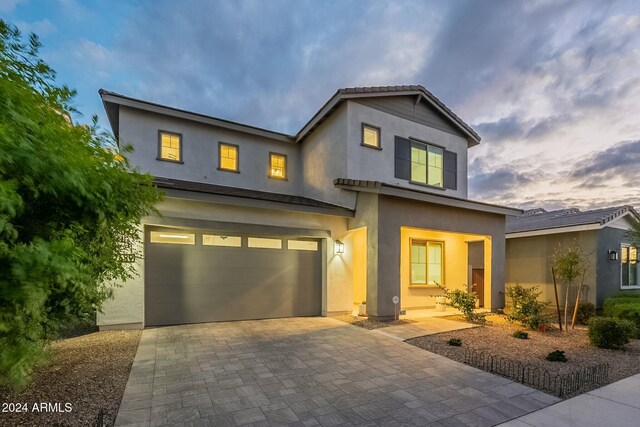 view of front of home with a garage