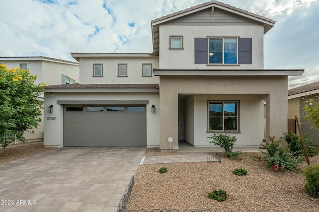 view of front of property with a garage