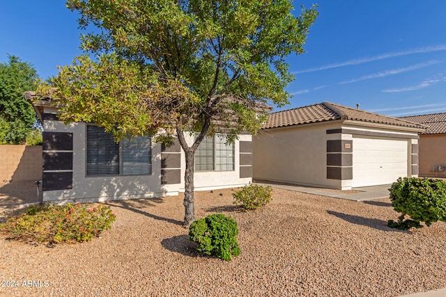 view of front of home with a garage