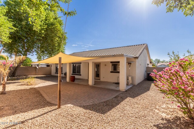 back of house featuring a patio