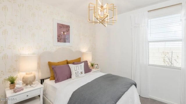 12438 E Verbina Ln, Florence, AZ 85132 - bedroom featuring a chandelier and wallpapered walls