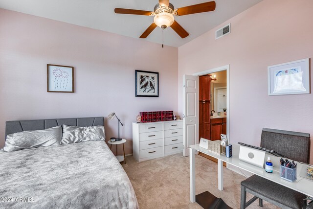 bedroom with ceiling fan and light carpet