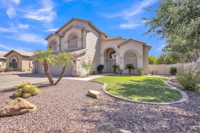 2642 S Joplin, Mesa, AZ 85209 - mediterranean / spanish-style home featuring driveway, stucco siding, a tiled roof, and a garage