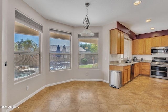 2642 S Joplin, Mesa, AZ 85209 - kitchen featuring appliances with stainless steel finishes, decorative light fixtures, recessed lighting, light tile patterned flooring, and light stone countertops