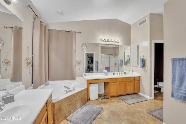 2642 S Joplin, Mesa, AZ 85209 - bathroom featuring lofted ceiling, two vanities, a garden tub, a shower stall, and tile patterned flooring