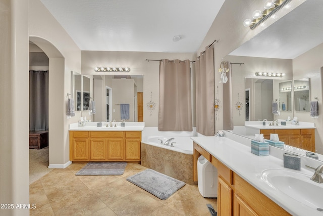 2642 S Joplin, Mesa, AZ 85209 - full bathroom featuring two vanities, a garden tub, and tile patterned flooring