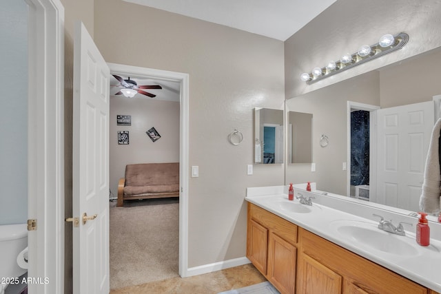 2642 S Joplin, Mesa, AZ 85209 - bathroom with double vanity, ensuite bathroom, and ceiling fan