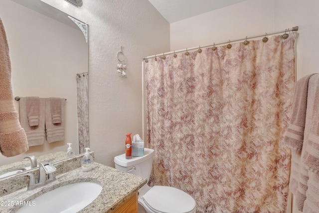 2642 S Joplin, Mesa, AZ 85209 - full bathroom with vanity, curtained shower, and a textured wall
