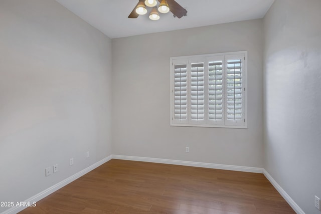 unfurnished room featuring ceiling fan and wood-type flooring