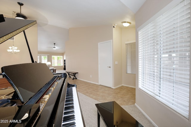 5451 W Folley St, Chandler, AZ 85226 - exercise area featuring lofted ceiling, tile patterned floors, baseboards, a chandelier, and a ceiling fan