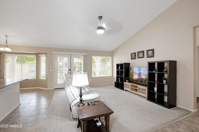 5451 W Folley St, Chandler, AZ 85226 - living room with ceiling fan, baseboards, a chandelier, tile patterned flooring, and high vaulted ceiling