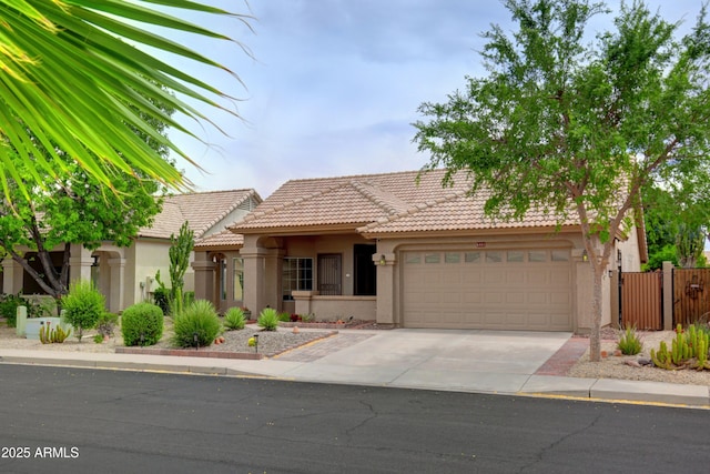 5451 W Folley St, Chandler, AZ 85226 - view of front of property featuring stucco siding, an attached garage, driveway, and a tiled roof
