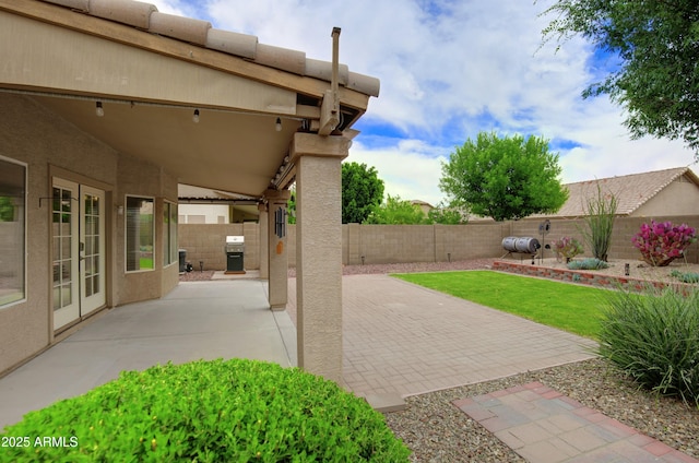 5451 W Folley St, Chandler, AZ 85226 - fenced backyard featuring a patio and french doors