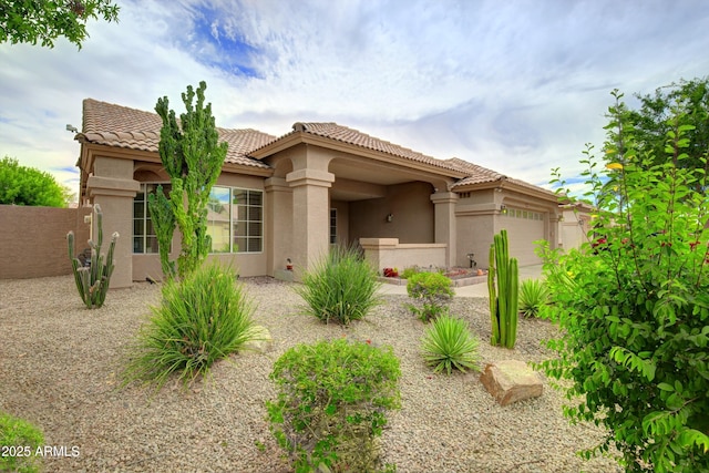 5451 W Folley St, Chandler, AZ 85226 - mediterranean / spanish-style home featuring stucco siding, a garage, and a tiled roof