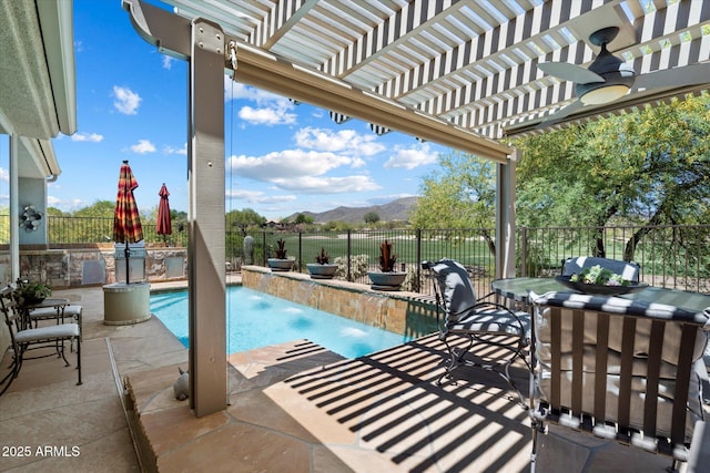 view of pool featuring a pergola, area for grilling, a fenced backyard, a fenced in pool, and a patio area