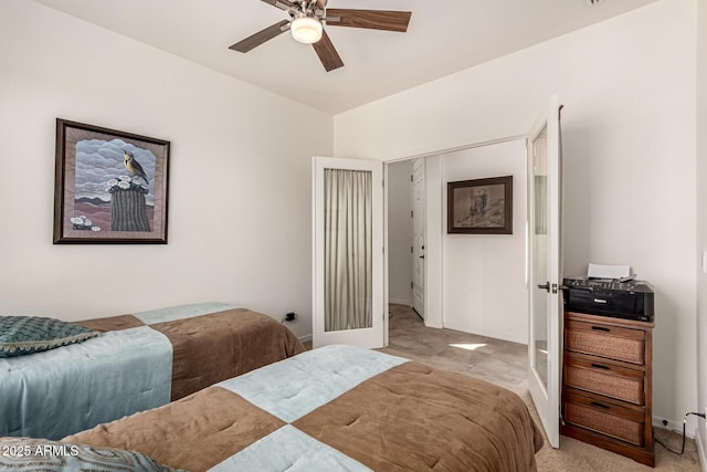 bedroom featuring baseboards and a ceiling fan