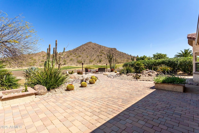view of patio with a mountain view