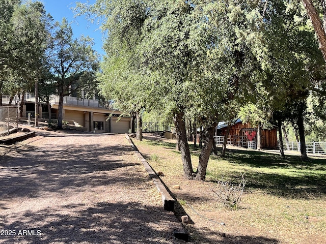 2160 S Moonlight Dr, Star Valley, AZ 85541 - view of front of property with an attached garage, driveway, and a barn