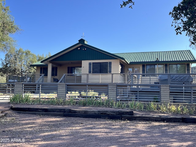 2160 S Moonlight Dr, Star Valley, AZ 85541 - view of front facade featuring a metal roof and brick siding