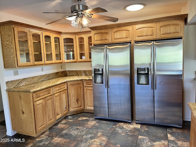 2160 S Moonlight Dr, Star Valley, AZ 85541 - kitchen with stainless steel refrigerator with ice dispenser, glass insert cabinets, a ceiling fan, and light stone countertops