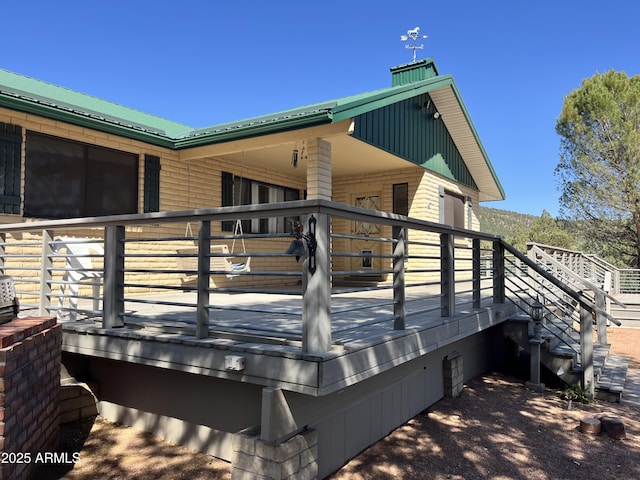 2160 S Moonlight Dr, Star Valley, AZ 85541 - view of side of home featuring a wooden deck, a chimney, stairway, and a metal roof