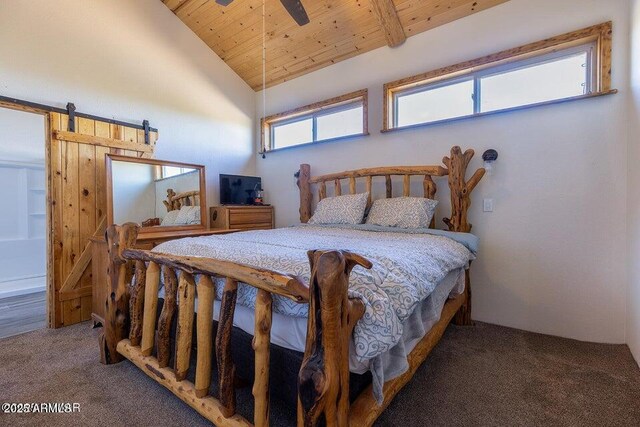 24 N County Road N3101, Vernon, AZ 85940 - bedroom with a barn door, a ceiling fan, wood ceiling, carpet flooring, and high vaulted ceiling