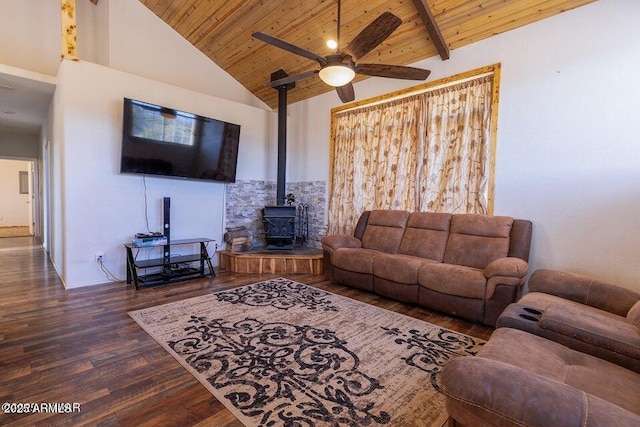 24 N County Road N3101, Vernon, AZ 85940 - living room with high vaulted ceiling, wood ceiling, ceiling fan, a wood stove, and dark wood finished floors