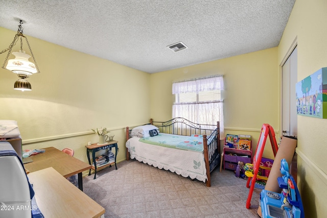 11630 N 74th Dr, Peoria, AZ 85345 - carpeted bedroom featuring visible vents and a textured ceiling