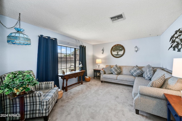 11630 N 74th Dr, Peoria, AZ 85345 - living area with carpet flooring, a textured ceiling, and visible vents