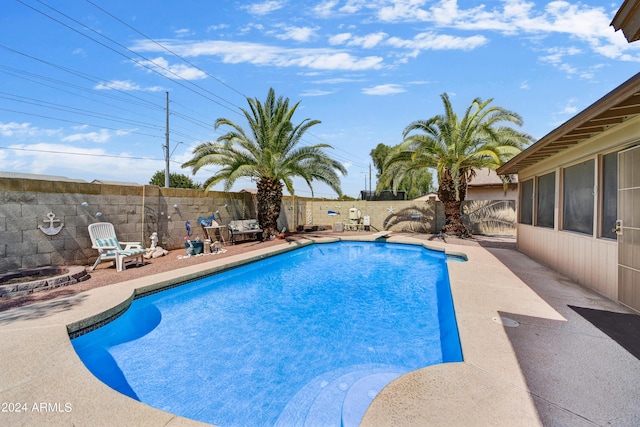 11630 N 74th Dr, Peoria, AZ 85345 - view of swimming pool featuring a fenced backyard, a fenced in pool, and a patio