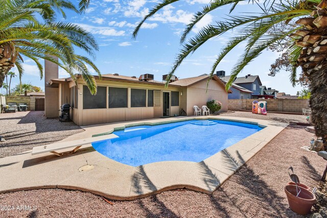 11630 N 74th Dr, Peoria, AZ 85345 - view of pool with a fenced in pool, a fenced backyard, a diving board, and a patio area