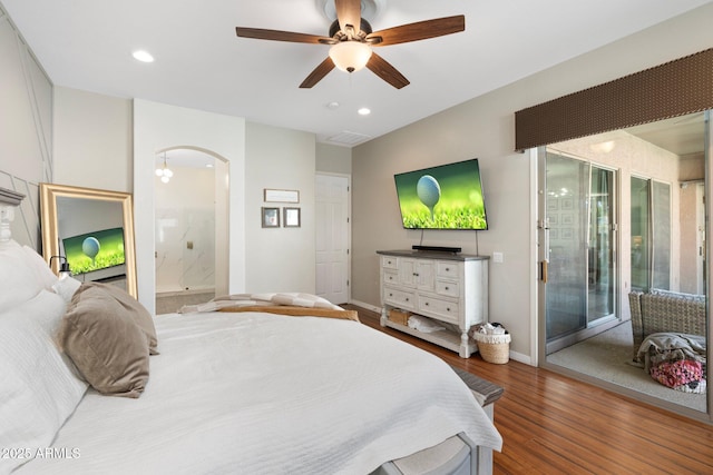 10722 E Keats Ave, Mesa, AZ 85209 - bedroom with recessed lighting, arched walkways, access to outside, and wood finished floors