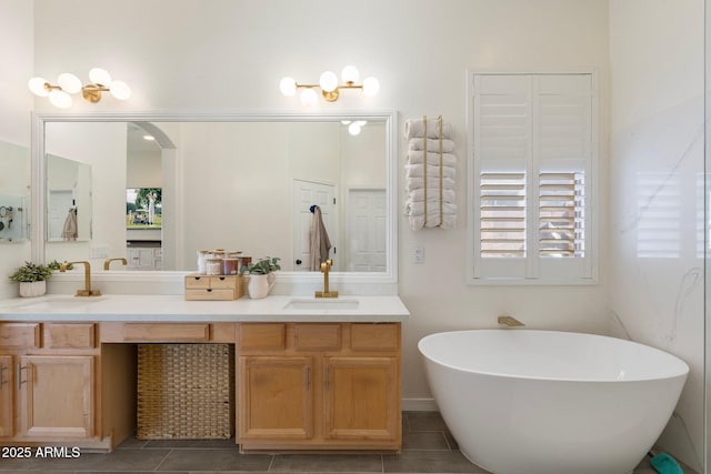 10722 E Keats Ave, Mesa, AZ 85209 - full bath featuring tile patterned flooring, double vanity, a sink, and a soaking tub