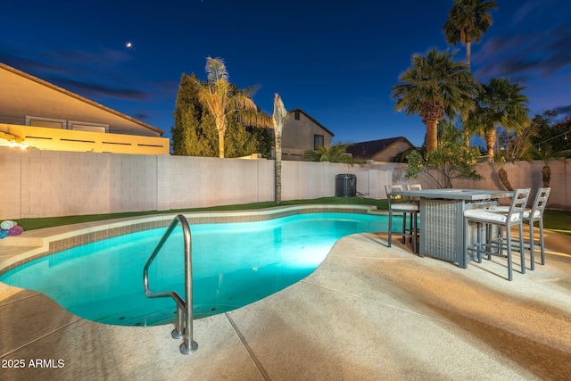 10722 E Keats Ave, Mesa, AZ 85209 - view of swimming pool featuring a fenced in pool, outdoor dining space, a patio area, central AC unit, and a fenced backyard