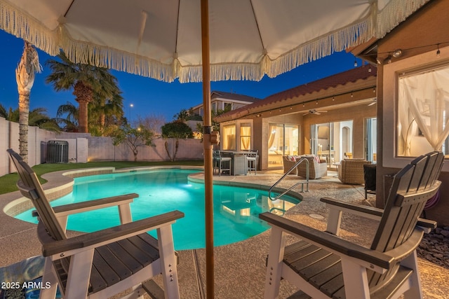 10722 E Keats Ave, Mesa, AZ 85209 - view of pool with an outdoor hangout area, a fenced backyard, a patio, a fenced in pool, and central AC unit