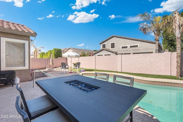10722 E Keats Ave, Mesa, AZ 85209 - view of patio / terrace with an outdoor fire pit, a fenced backyard, and a fenced in pool