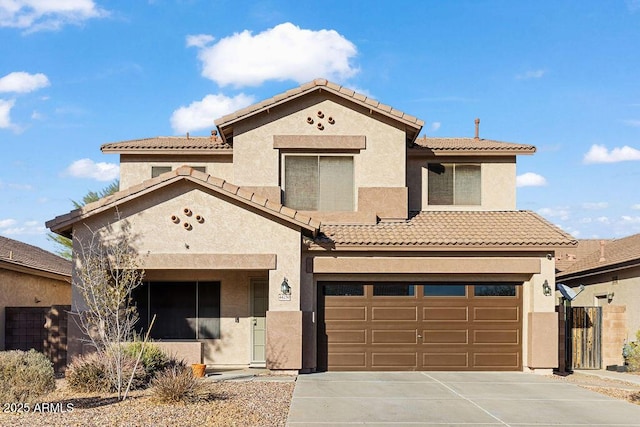 mediterranean / spanish-style house featuring a garage